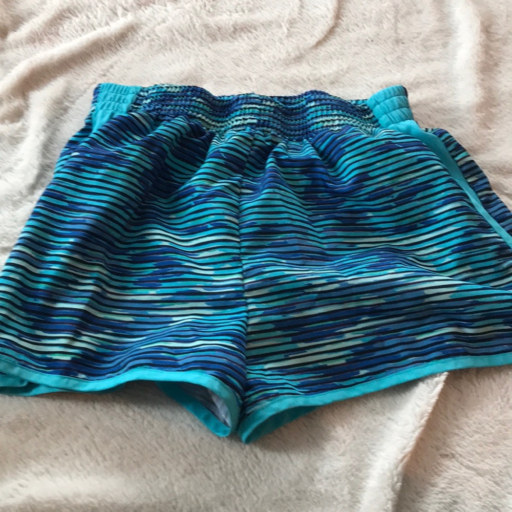 Different shades of blue sports shorts